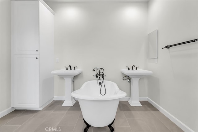7420 Desert Sky Dr, Yucca Valley, CA 92284 - full bathroom featuring a soaking tub and tile patterned flooring