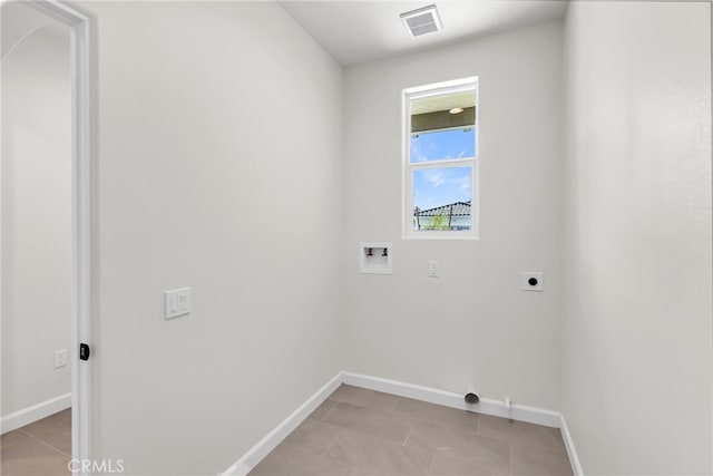 7420 Desert Sky Dr, Yucca Valley, CA 92284 - laundry area with electric dryer hookup, washer hookup, and light tile patterned flooring