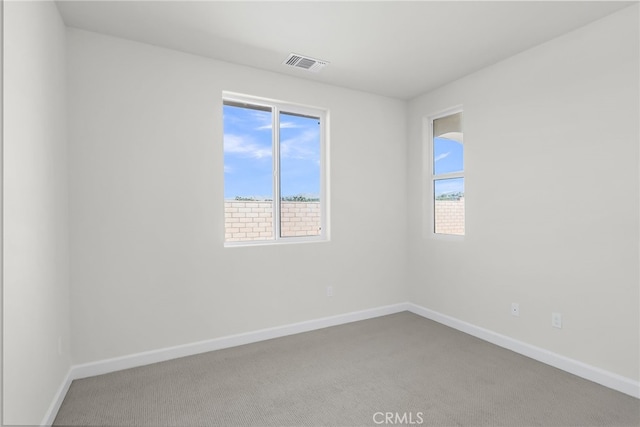 7420 Desert Sky Dr, Yucca Valley, CA 92284 - carpeted empty room with baseboards
