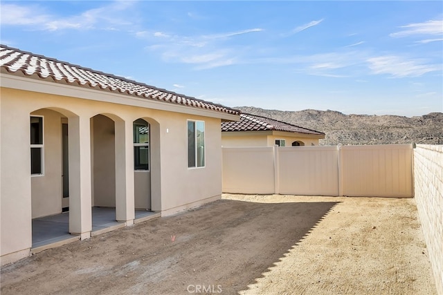 7420 Desert Sky Dr, Yucca Valley, CA 92284 - view of patio featuring a mountain view