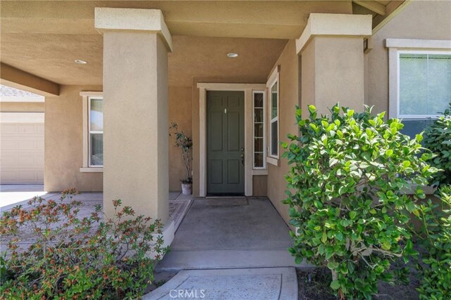 6631 Aggies Ct, Winton, CA 95388 - doorway to property with stucco siding