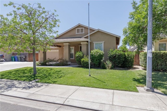 6631 Aggies Ct, Winton, CA 95388 - view of front of home with stucco siding and driveway