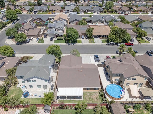 6631 Aggies Ct, Winton, CA 95388 - aerial view of residential area with a pool area