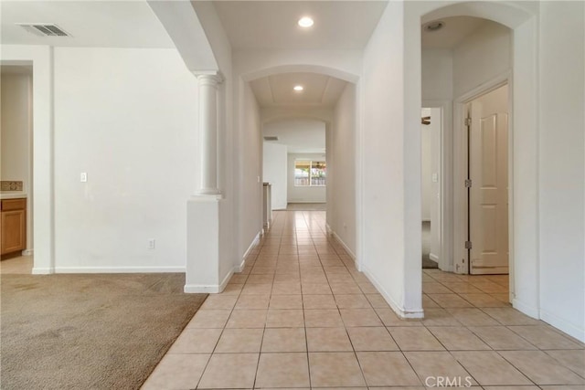 6631 Aggies Ct, Winton, CA 95388 - hallway featuring light tile patterned floors, recessed lighting, and arched walkways