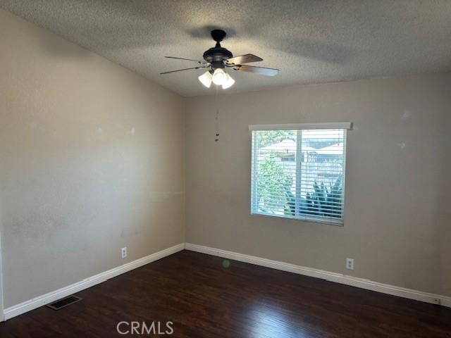 10412 Comstock Rd, Corona, CA 92883 - spare room featuring wood finished floors, a textured ceiling, and a ceiling fan