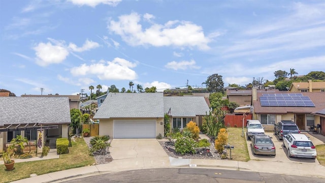 151 Camino Vista Real, Chula Vista, CA 91910 - view of front of house with stucco siding, concrete driveway, a garage, and a residential view