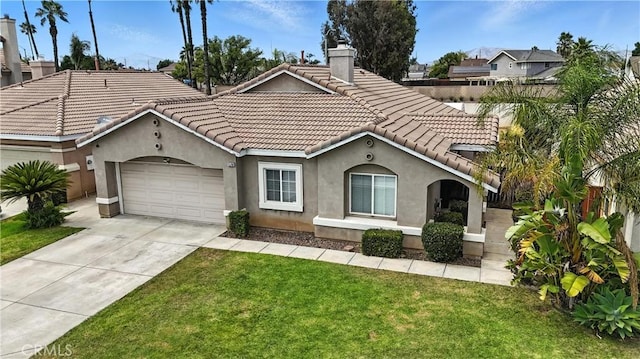 25780 Jumano Dr, Moreno Valley, CA 92551 - mediterranean / spanish-style home featuring a chimney, stucco siding, a front lawn, and a garage