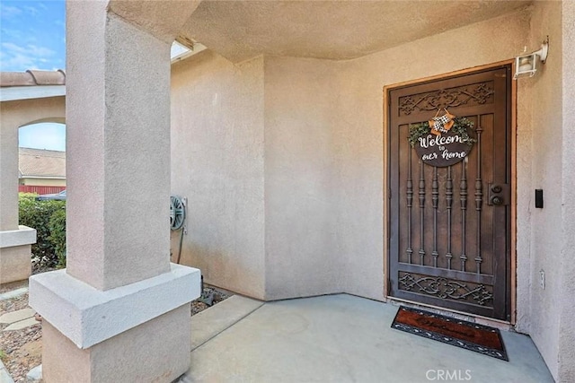 25780 Jumano Dr, Moreno Valley, CA 92551 - view of exterior entry featuring stucco siding