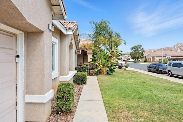 25780 Jumano Dr, Moreno Valley, CA 92551 - view of grassy yard featuring a residential view