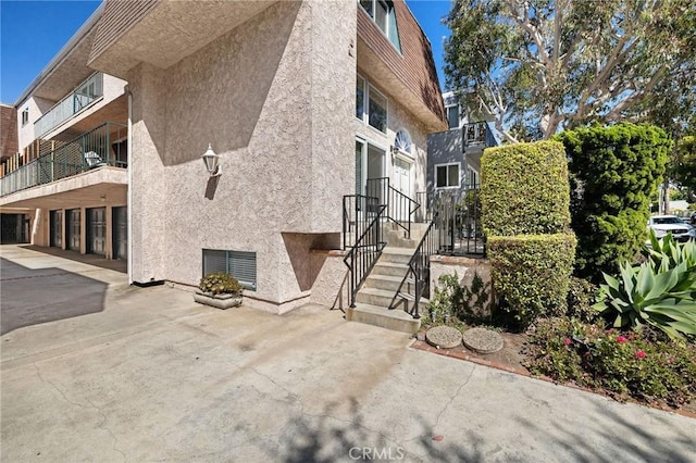 312 N Francisca Ave Unit 1, Redondo Beach, CA 90277 - view of side of property featuring stucco siding