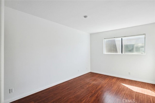 312 N Francisca Ave Unit 1, Redondo Beach, CA 90277 - empty room with wood finished floors and baseboards