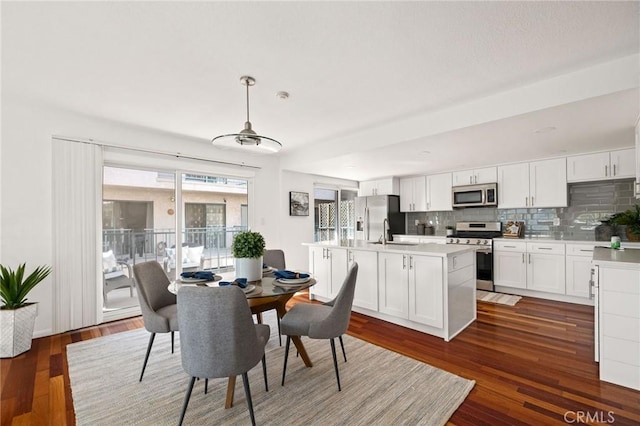 312 N Francisca Ave Unit 1, Redondo Beach, CA 90277 - dining room featuring dark wood-style flooring