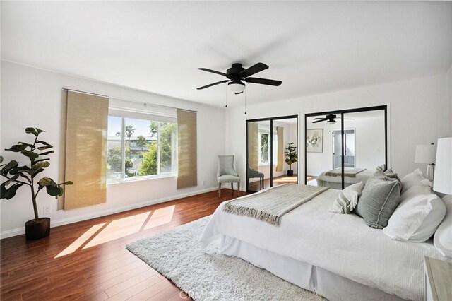312 N Francisca Ave Unit 1, Redondo Beach, CA 90277 - bedroom featuring two closets, wood finished floors, and a ceiling fan