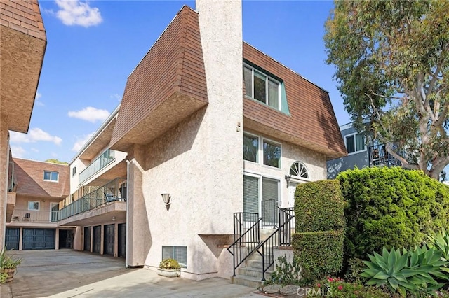 312 N Francisca Ave Unit 1, Redondo Beach, CA 90277 - view of property featuring driveway and a garage