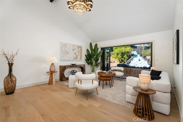 6032 Sun Knoll Cir, Yorba Linda, CA 92886 - sitting room featuring wood finished floors, a chandelier, and high vaulted ceiling