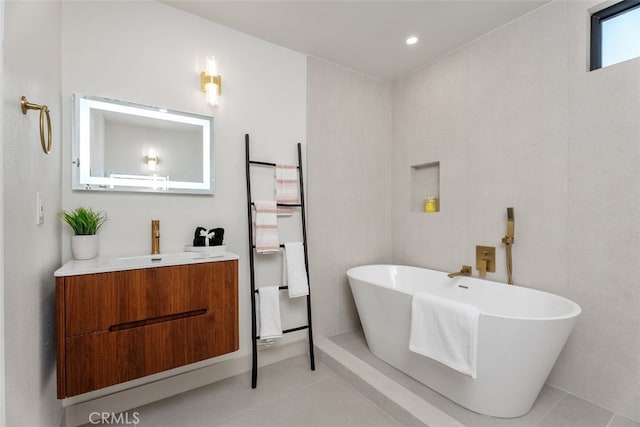 6032 Sun Knoll Cir, Yorba Linda, CA 92886 - bathroom featuring tile patterned floors, a freestanding bath, vanity, and recessed lighting