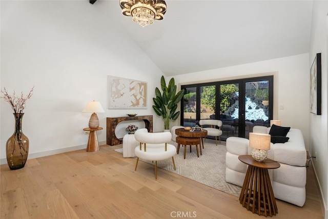 6032 Sun Knoll Cir, Yorba Linda, CA 92886 - living area with wood finished floors, a chandelier, and high vaulted ceiling
