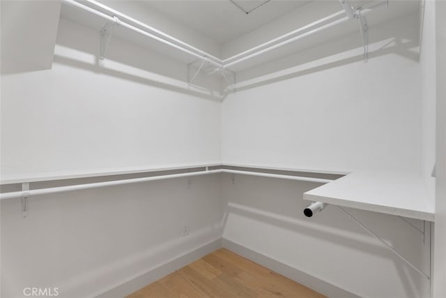 6032 Sun Knoll Cir, Yorba Linda, CA 92886 - spacious closet with light wood finished floors