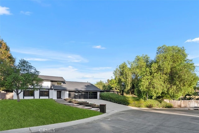 6032 Sun Knoll Cir, Yorba Linda, CA 92886 - view of front of property with concrete driveway, an attached garage, and stucco siding