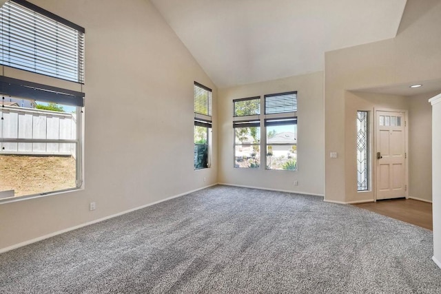 2053 Sequoia St, San Marcos, CA 92078 - empty room with high vaulted ceiling and carpet flooring