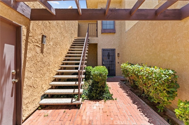 42821 15th St W Unit 4, Lancaster, CA 93534 - property entrance featuring stucco siding