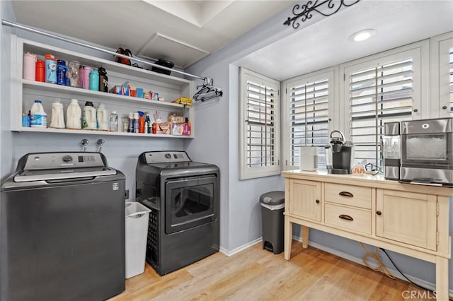 42821 15th St W Unit 4, Lancaster, CA 93534 - laundry room featuring washer and clothes dryer and light wood-style flooring