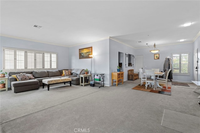 42821 15th St W Unit 4, Lancaster, CA 93534 - living area with crown molding and carpet flooring