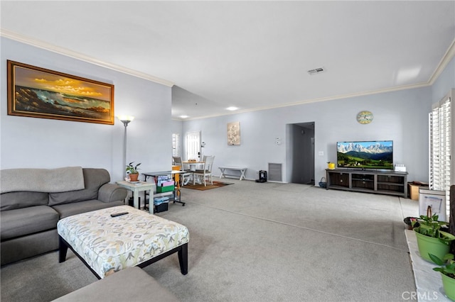 42821 15th St W Unit 4, Lancaster, CA 93534 - carpeted living room with ornamental molding and healthy amount of natural light