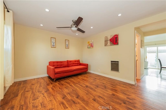 3 Albany Unit 61, Irvine, CA 92604 - living area featuring heating unit, a ceiling fan, wood finished floors, and recessed lighting