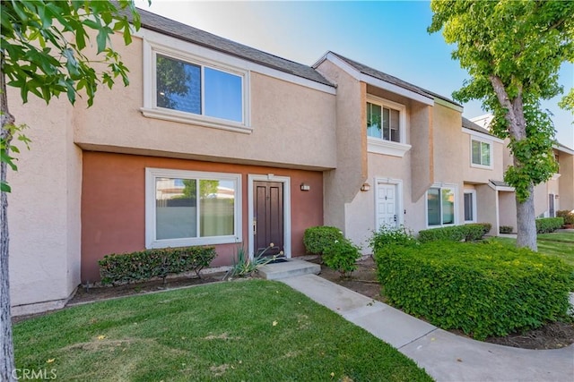 3 Albany Unit 61, Irvine, CA 92604 - multi unit property featuring stucco siding and a front yard