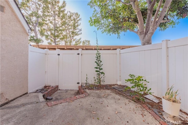 3 Albany Unit 61, Irvine, CA 92604 - fenced backyard with a gate and a patio