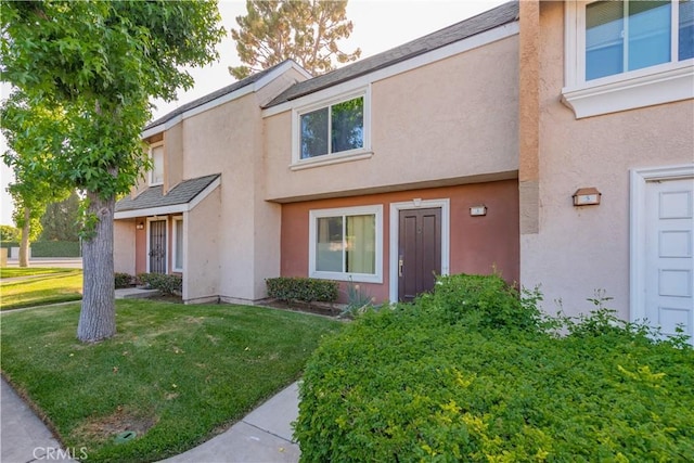3 Albany Unit 61, Irvine, CA 92604 - townhome / multi-family property featuring stucco siding and a front lawn
