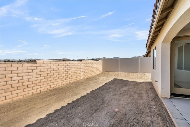7408 Desert Sky Dr, Yucca Valley, CA 92284 - fenced backyard with a patio area