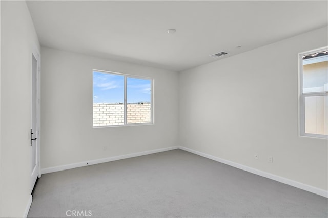 7408 Desert Sky Dr, Yucca Valley, CA 92284 - carpeted spare room featuring baseboards