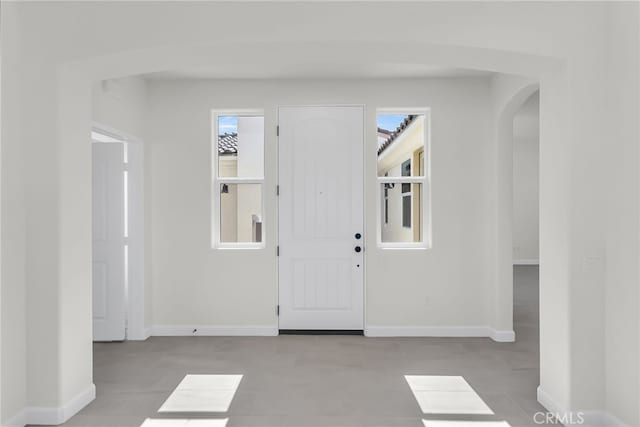 7408 Desert Sky Dr, Yucca Valley, CA 92284 - foyer with baseboards and arched walkways