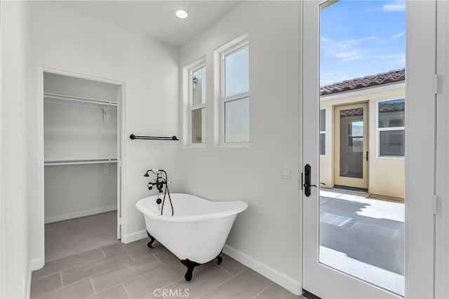 7408 Desert Sky Dr, Yucca Valley, CA 92284 - full bathroom featuring a freestanding bath, a spacious closet, and recessed lighting