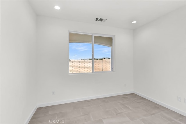 7408 Desert Sky Dr, Yucca Valley, CA 92284 - spare room featuring baseboards and recessed lighting
