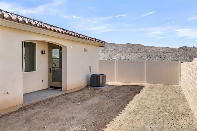 7408 Desert Sky Dr, Yucca Valley, CA 92284 - view of patio / terrace with a mountain view