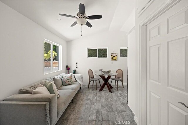 3532 Mesquite Dr, Calabasas, CA 91302 - living area featuring vaulted ceiling, a ceiling fan, and wood finished floors