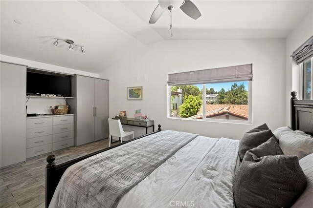 3532 Mesquite Dr, Calabasas, CA 91302 - bedroom featuring multiple windows, lofted ceiling, and ceiling fan