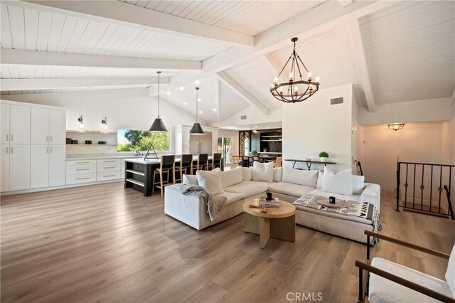 3532 Mesquite Dr, Calabasas, CA 91302 - living room with a chandelier and light wood-style flooring