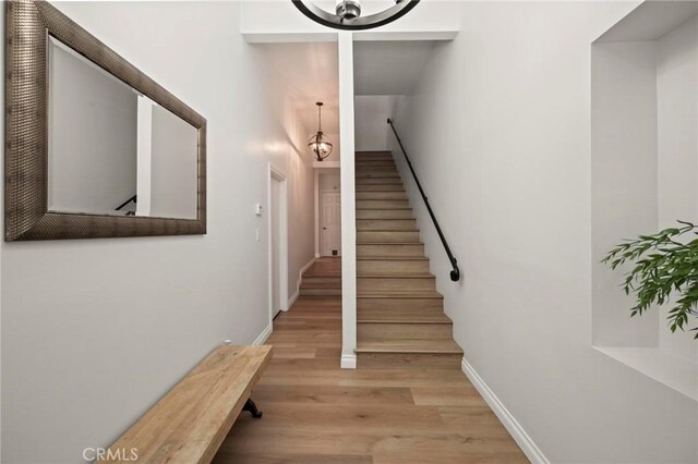 3532 Mesquite Dr, Calabasas, CA 91302 - stairway with wood finished floors and baseboards