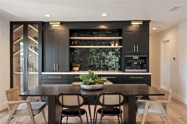 3532 Mesquite Dr, Calabasas, CA 91302 - bar area with oven, light wood-type flooring, and recessed lighting