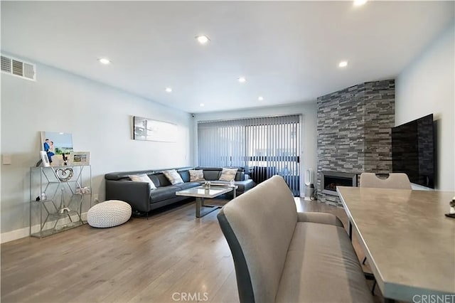 1236 N Columbus Ave Unit 28, Glendale, CA 91202 - living room featuring wood finished floors and recessed lighting