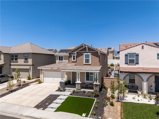 554 Cumberland Rd, Rialto, CA 92377 - view of front of house featuring a porch, stucco siding, concrete driveway, and a tiled roof