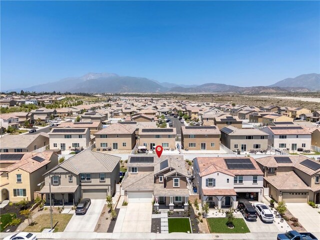 554 Cumberland Rd, Rialto, CA 92377 - aerial perspective of suburban area with a mountain backdrop
