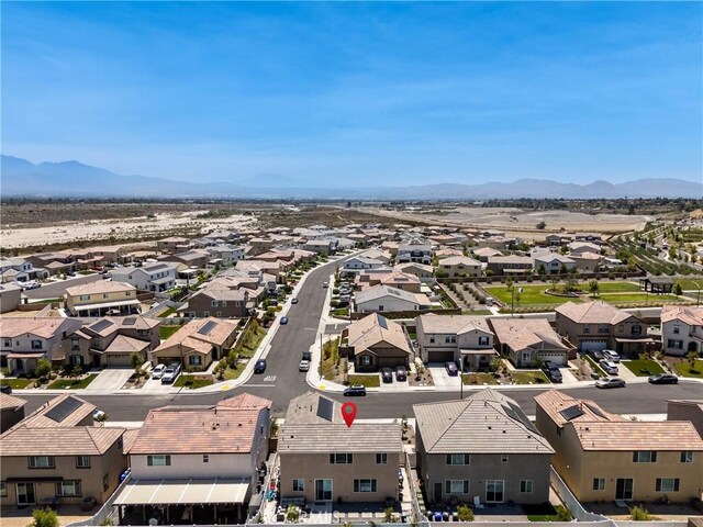554 Cumberland Rd, Rialto, CA 92377 - aerial view of residential area featuring a mountain backdrop
