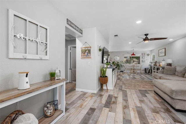 23317 Badger Creek Ln, Menifee, CA 92587 - living room with ceiling fan, wood finished floors, and recessed lighting