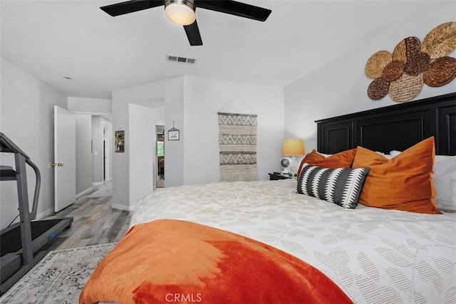 23317 Badger Creek Ln, Menifee, CA 92587 - bedroom featuring wood finished floors and a ceiling fan