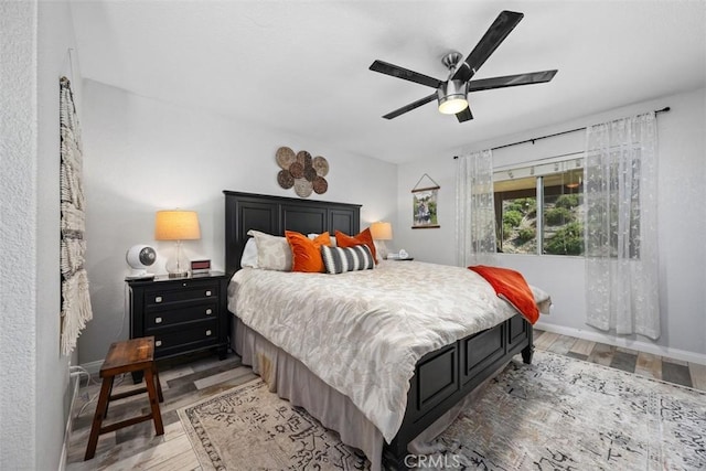 23317 Badger Creek Ln, Menifee, CA 92587 - bedroom featuring light wood finished floors and a ceiling fan